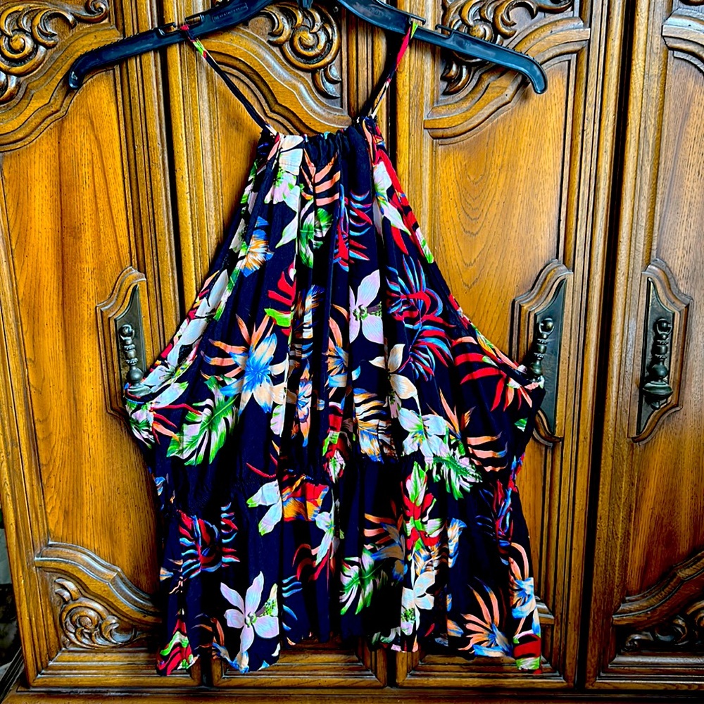 Tropical flowered themed tank top style blouse.